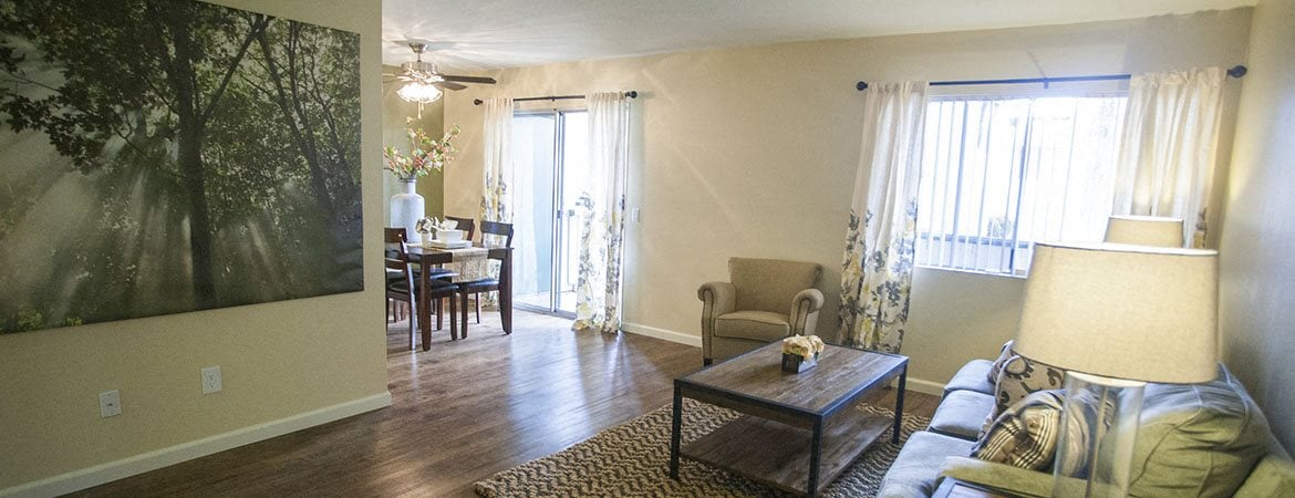 Living Room and Dining l Mill Creek Apartments in SAN BERNADINO,CA
